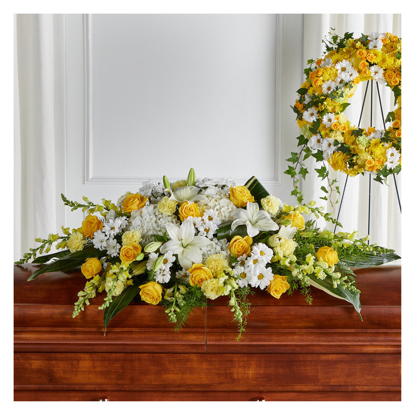 Golden Harmony Casket Spray flower arrangement